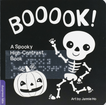 Cover of BOOOOK! with braille and black and white, high contrast print and images