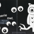 Interior spread with print and braille for BOOOOK! with a high contrast black and white image of an owl