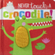 Cover of Never Touch a Crocodile with a red background and tactile green crocodile