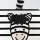 Cover of If I Were a Zebra with print, braille, and a picture of a zebra with a fuzzy nose on a black and white striped background