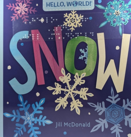 Cover of Hello World! Snow with print, braille, and a blue background with snowflakes.