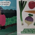 Interior spread of I Look Up to Michelle Obama with descriptive print text, braille, and an illustration of a Michelle and a variety of vegetables