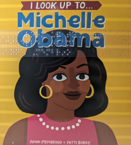 Cover of I Look Up to Michelle Obama with picture of Michelle and braille