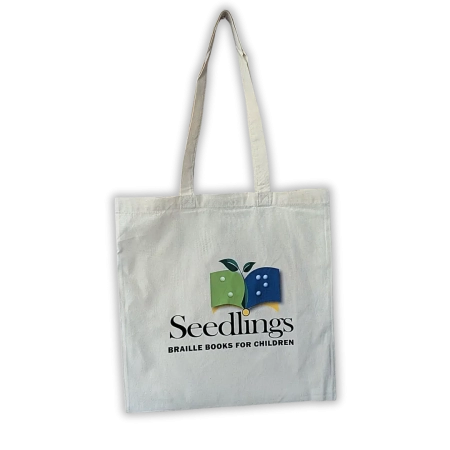 White cotton Seedlings Braille Books for Children tote bag with logo on white background.