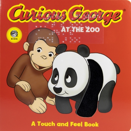 The cartoon monkey Curious George sits beside a baby panda. the baby panda has tactile fur on its arm.