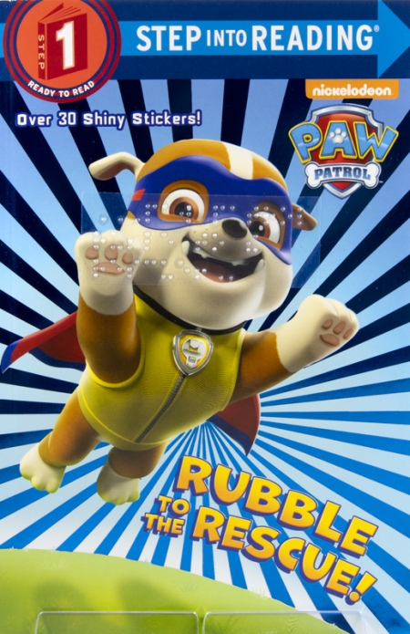 A puppy, dressed as a superhero, jumps forward. It's wearing a cape and face mask, and smiles widely.