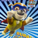 A puppy, dressed as a superhero, jumps forward. It's wearing a cape and face mask, and smiles widely.